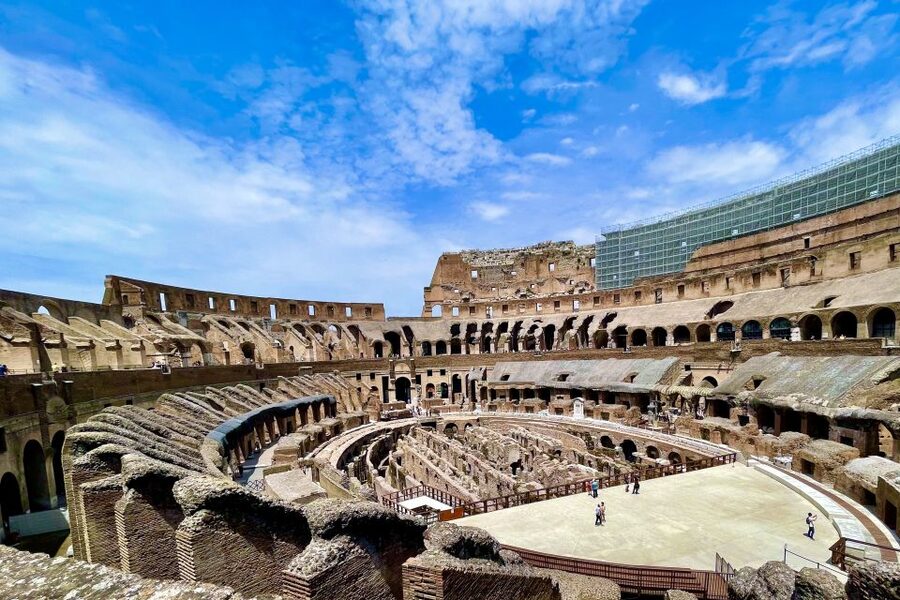 Rome: Colosseum, Arena Floor & Ancient Rome Tour - Walking through the Roman Forum