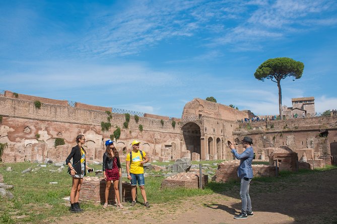 Rome: Colosseum Arena, Roman Forum & Palatine Hill Tour - The first and second tiers put the crowd in context