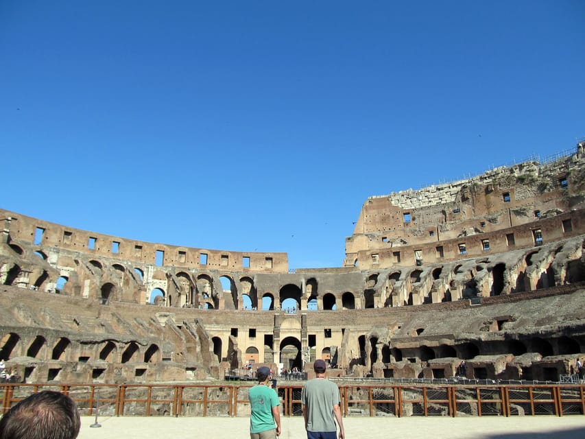 Rome: Colosseum Experience with Audio Guide and Arena Option - Meeting your host above Colosseo Metro Station
