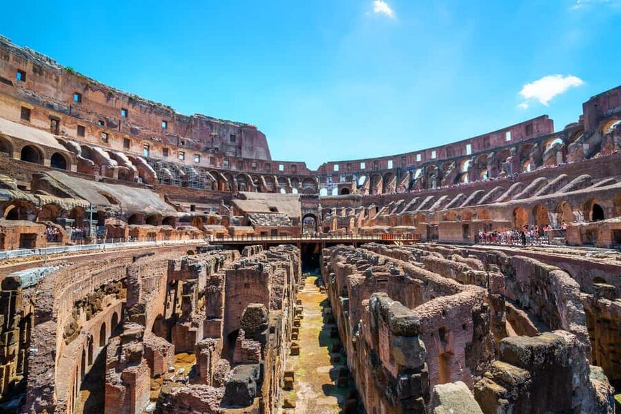 Rome: Colosseum Express Tour with Forum & Palatine Access - Entering the Colosseum in the morning
