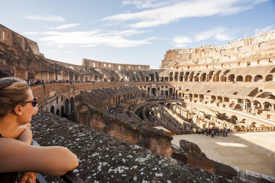 Rome: Colosseum, Forum, Palatine Hill Entry & Audioguide App - Inside the Colosseum: scale, stone, and surviving machinery