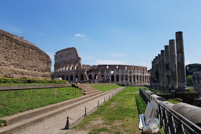 Rome: Colosseum, Palatine Hill and Roman Forum Guided Tour - Outside the Colosseum, begin with the building itself