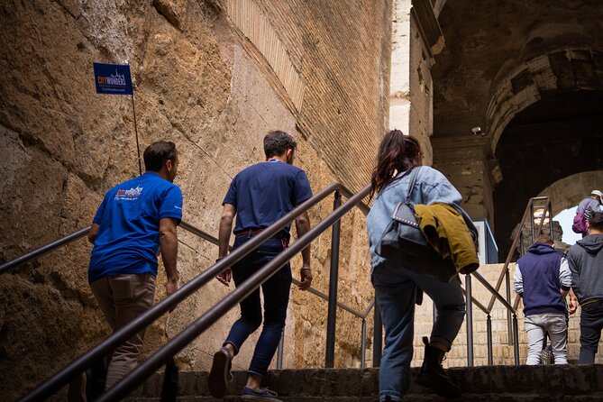 Rome: Colosseum, Roman Forum, and Palatine Hill Guided Tour - Entering the Colosseum with a guide