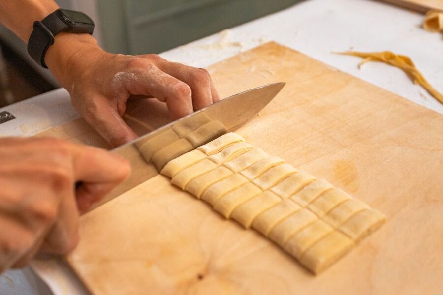 Rome: Fettuccine and Tiramisu Cooking Class with Wine - Sitting down to eat what you made