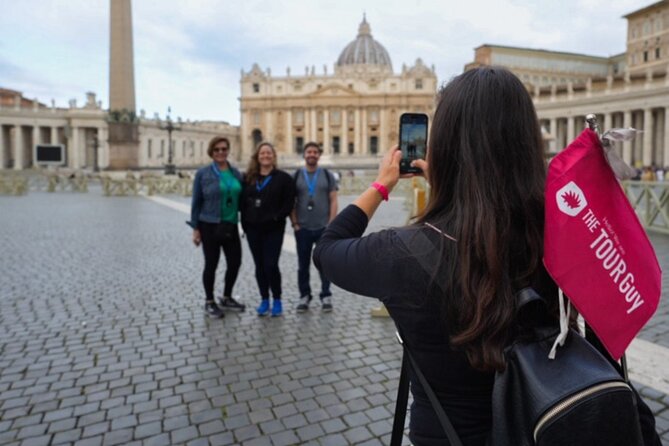 Rome in a Day Group Tour with Vatican Museums and Colosseum - Trevi Fountain is iconic, crowded, and quick
