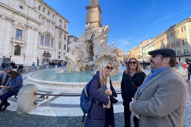 Rome in a Day Group Tour with Vatican Museums and Colosseum - Entering the Colosseum with the group