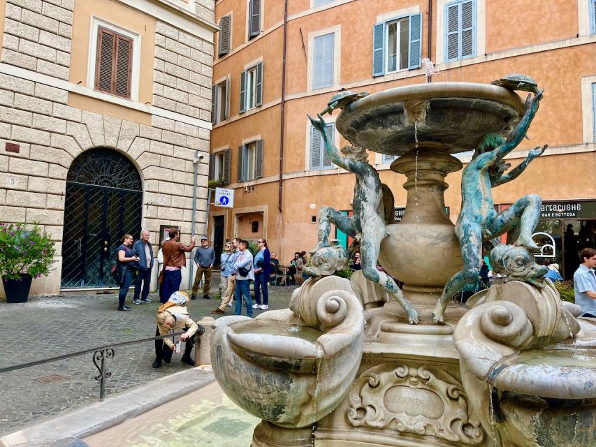 Rome: Jewish Ghetto and Trastevere Tour - Entering through the Portico d’Ottavia