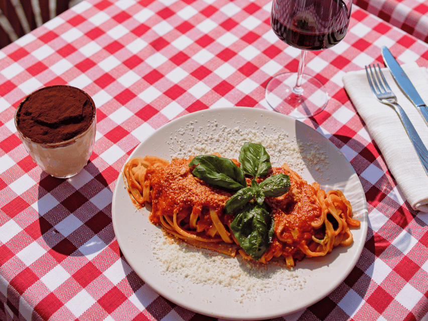 Rome: Pasta and Tiramisu Cooking Class in Piazza Navona - Making fresh fettuccine by hand