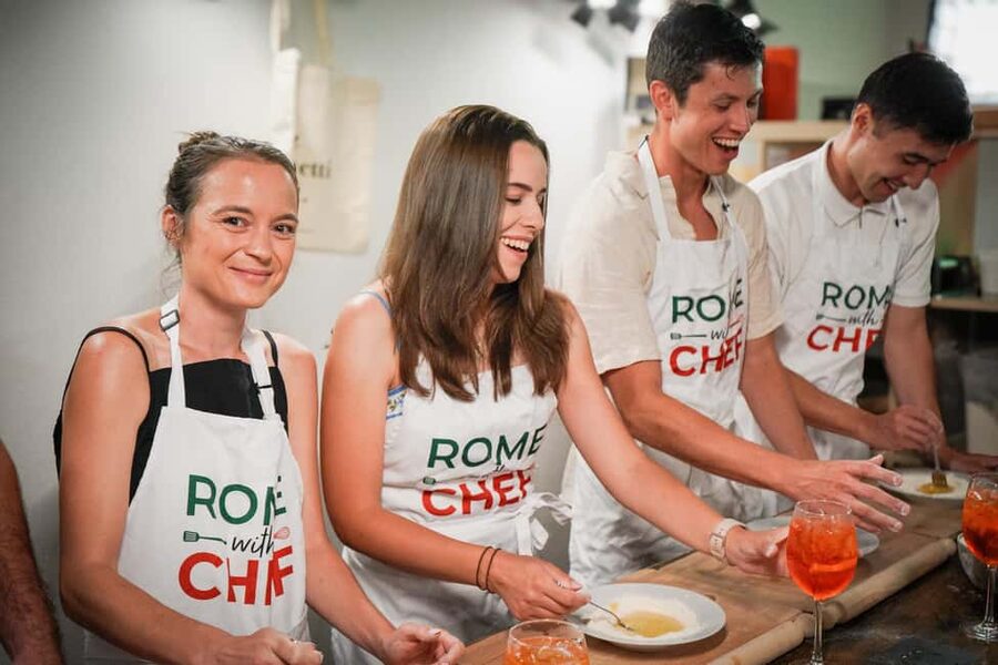 Rome: Spritz & Spaghetti Cooking Class - Rolling and cutting fresh fettuccine