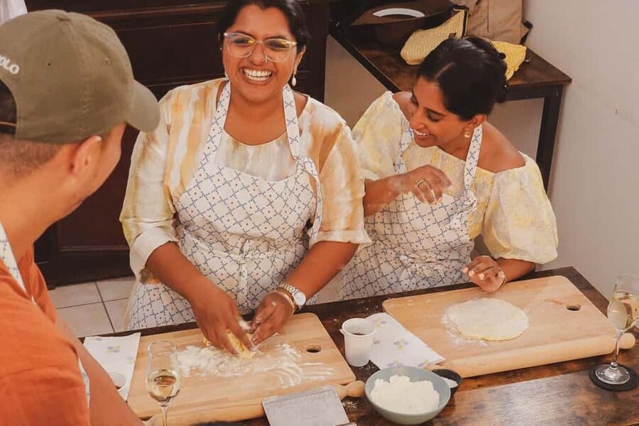 Rome: Traditional Pasta, Spritz & Tiramisu Cooking Class - Sitting down to eat what you made