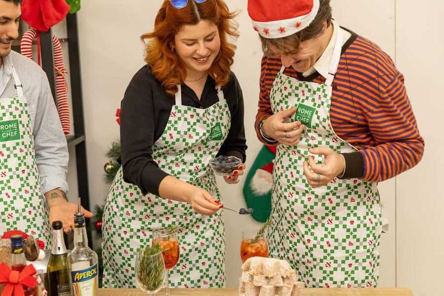 Rome: Traditional Pasta with Cocktails Cooking Class - Mixing Aperol, Hugo, and limoncello spritzes
