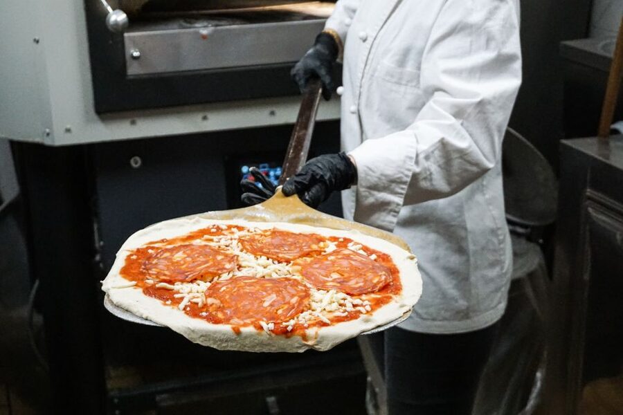 Rome: Traditional Pizza Cooking Class near Piazza Navona - The restaurant meal after the oven