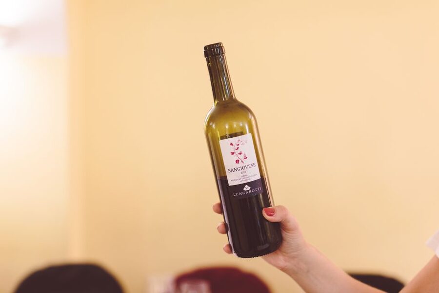 Rome: Twilight Trastevere Food Tour with Wine Tasting - Wine in a cellar older than the Colosseum