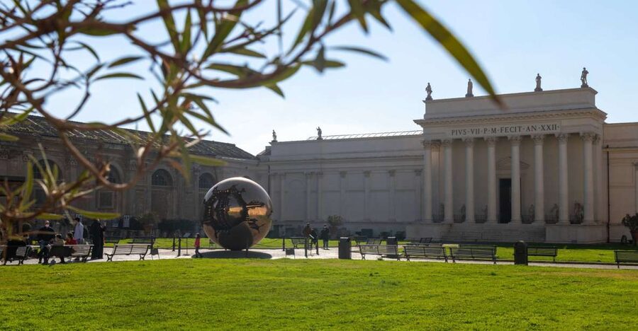 Rome: Vatican Museums, Sistine Chapel, and Basilica Tour - The Pine Cone Courtyard sets the tone