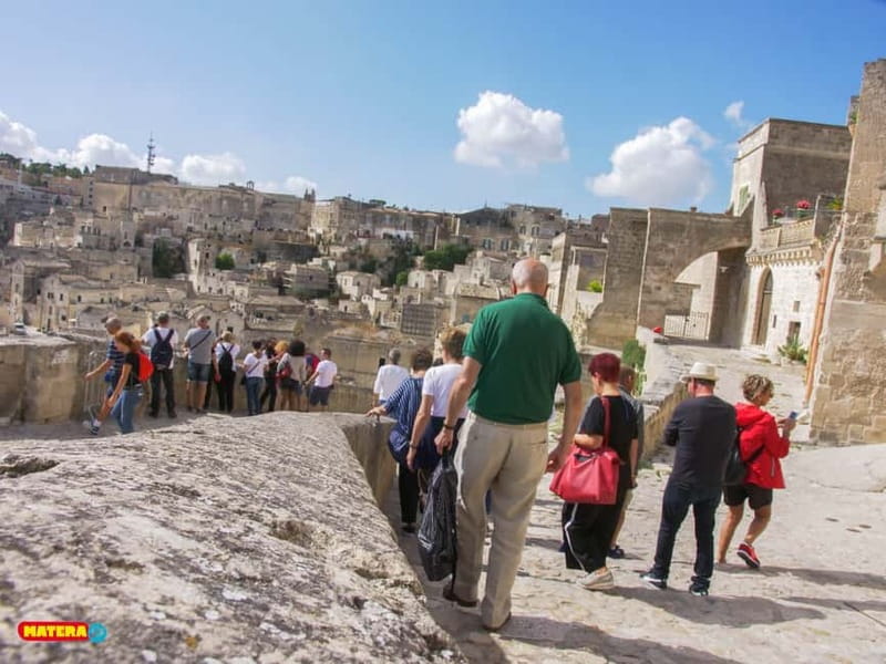 Sassi di Matera: Guided Walking Tour with Cave House/Church - Walking through Matera’s lanes and slopes