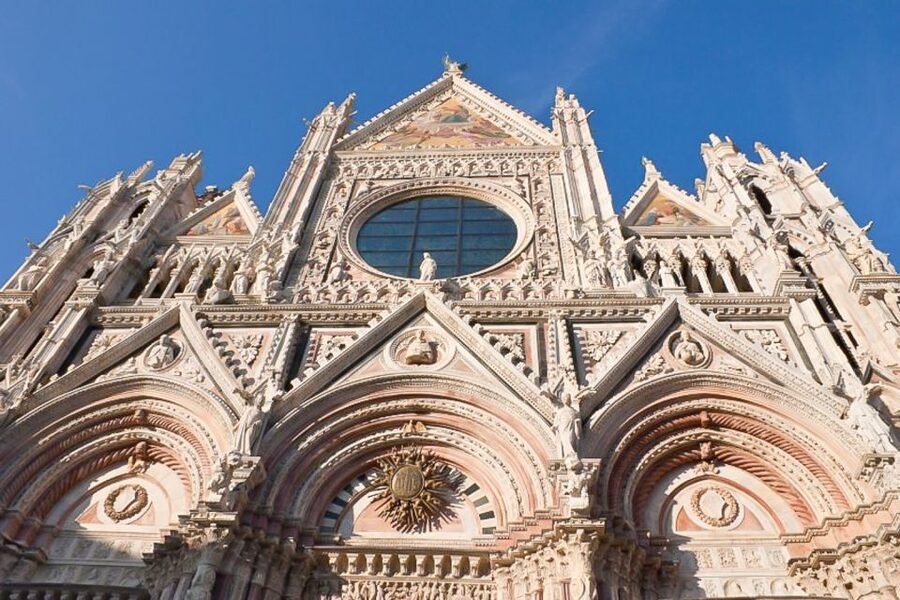 Siena: Walking Tour and Skip-the-Line Duomo Tickets - Palazzo Tolomei and the city’s Gothic face