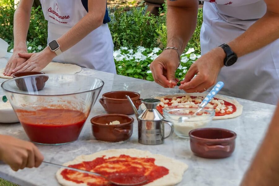 SORRENTO: Pizza School Mastering Neapolitan Delights - A shared table with wine and limoncello