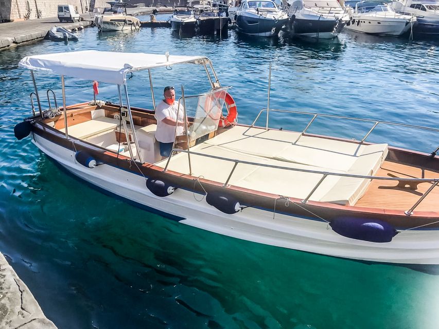 Sorrento: Sightseeing Cruise with Limoncello Tasting - Waterfalls, coves, and the main swim break