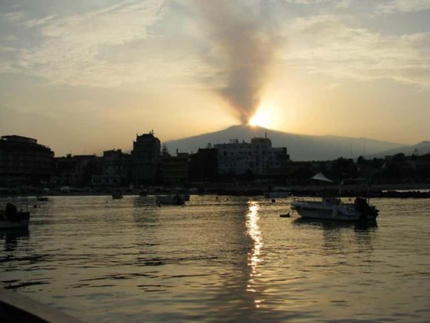 Sunset tour in search of dolphins with aperitif - The swimming stop near Taormina