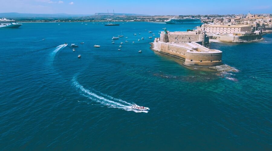 Syracuse: Pillirina, Ortigia, and Sea Caves Tour by Boat - Why seeing Syracuse from the sea changes the visit