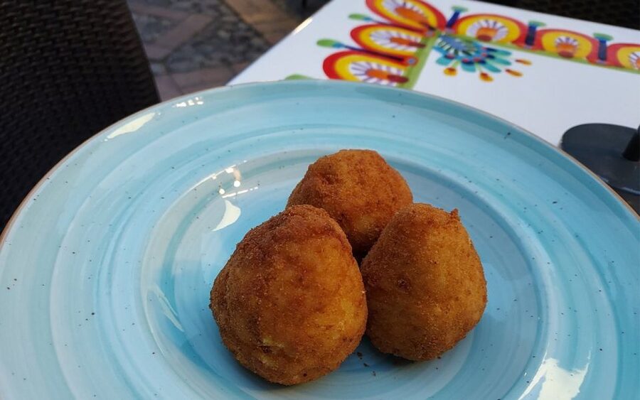 Taormina: Arancino Making Class with Drinks - A relaxed patio setting with real kitchen guidance