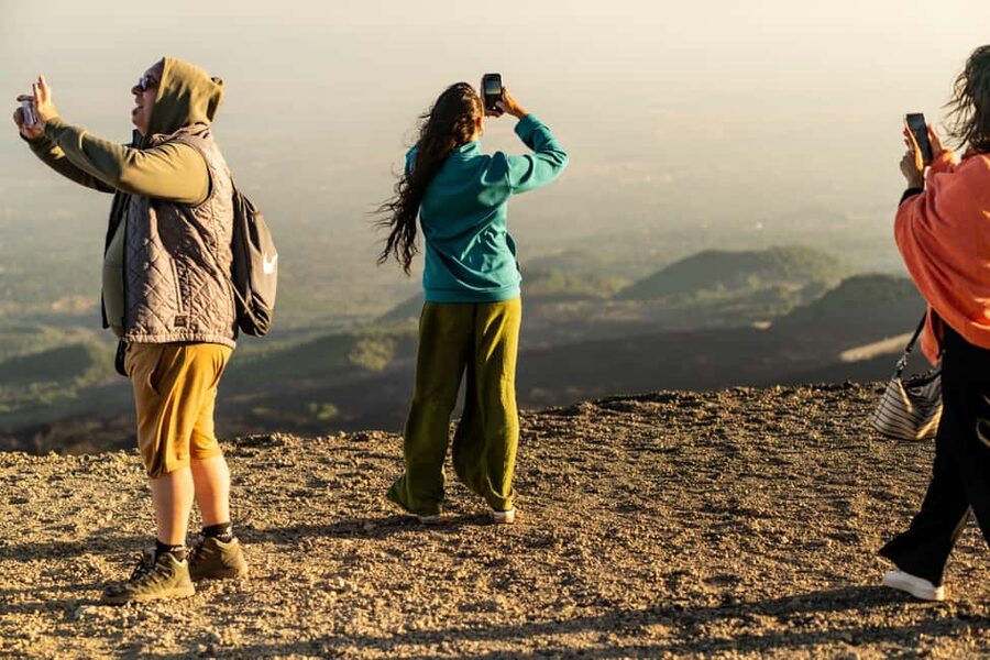 Taormina: Mount Etna Sunset Tour with Cave Visit and Tasting - Tasting Sicilian honey, wine, and local produce