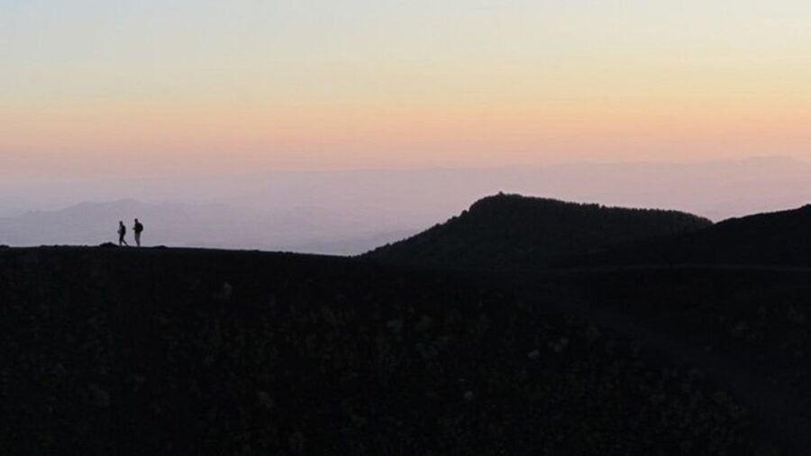 Taormina: Mount Etna Sunset Tour with Cave Visit and Tasting - Watching the sun disappear over Etna