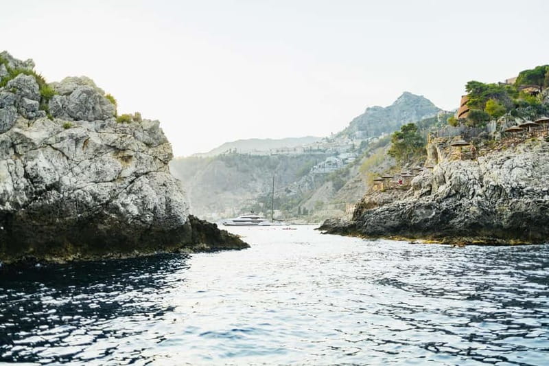 Taormina: Sunset Boat Tour with Dolphin Watching & Aperitif - Isola Bella, Mazzaro Bay, and San Nicola Bay