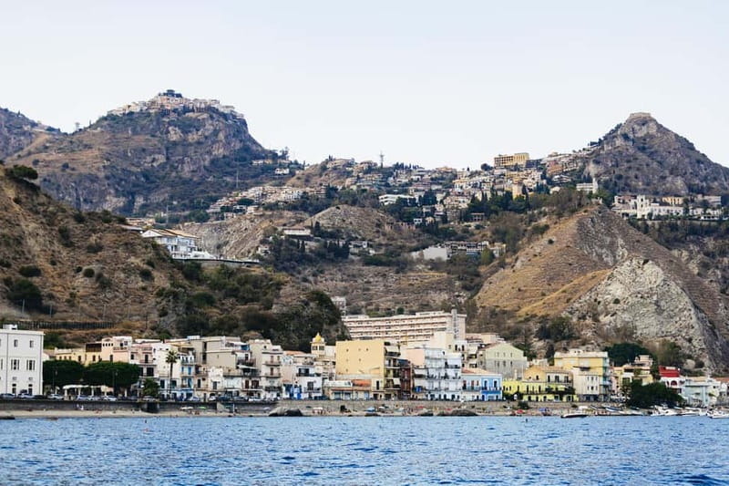 Taormina: Sunset Boat Tour with Dolphin Watching & Aperitif - Searching for dolphins in the open water
