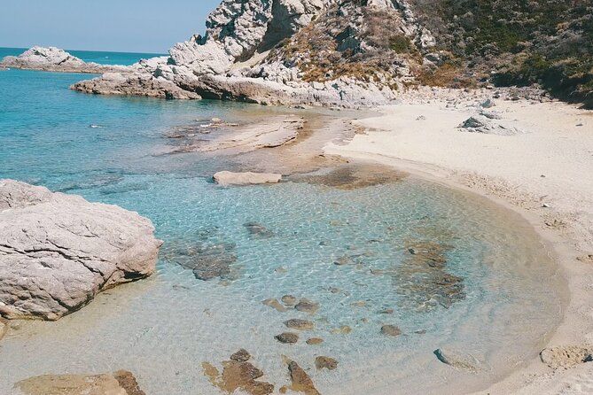 The best Boat Tour from Tropea to CapoVaticano, max 12 passengers - Grotticelle Beach and the floating aperitif
