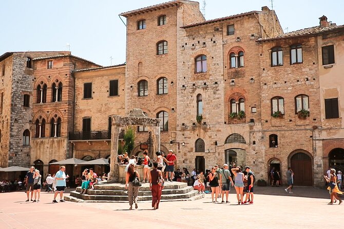 Tuscany: Day Trip to Pisa, Siena, San Gimignano, and Chianti - The coach ride, group size, and guide style