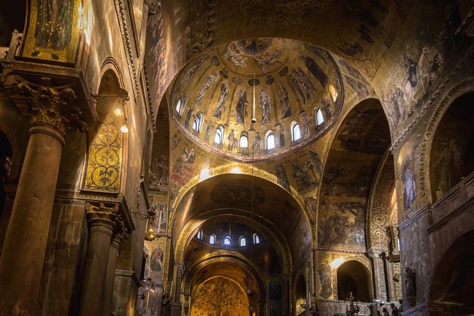 Venice's Best: Basilica, Doge's Palace, Gondola & History Gallery - A gondola ride through smaller canals and the Grand Canal
