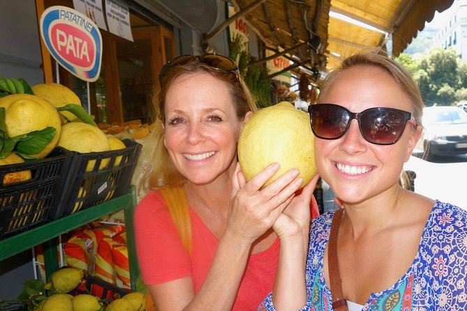 Walking Food Tour in Sorrento w/ Limoncello Factory Lemon Grove - A seated trattoria meal with pasta and wine